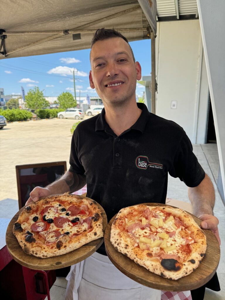 Fabio with pizzas